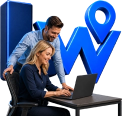 Shippers using the Logistware Canadian load board to manage freight on a laptop